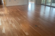 Refinished solid American Cherry wood floors.