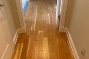 Refinished solid American Cherry wood floors.