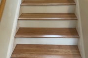 Refinished American Cherry stair treads.