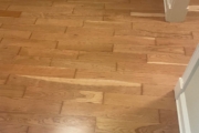 Refinished solid American Cherry wood floors.