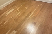 Refinished solid American Cherry wood floors.