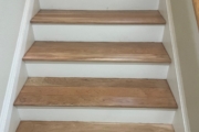 Refinished American Cherry stair treads.