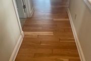 Refinished solid American Cherry wood floors.