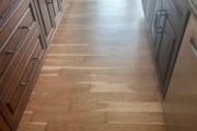 Refinished solid American Cherry wood floors.