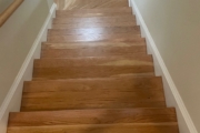 Refinished American Cherry flooring and stairs.