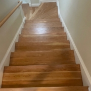 Refinished American Cherry flooring and stairs.