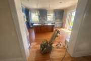 Refinishing Heart Pine flooring downstairs.