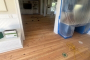 Refinishing Heart Pine flooring downstairs.