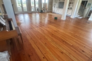 Refinishing Heart Pine flooring downstairs.