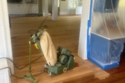 Refinishing Heart Pine flooring downstairs.