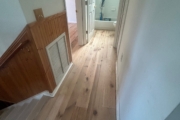 Sanding Oak flooring and stairs.