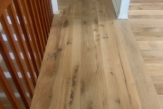 Sanding Oak flooring.