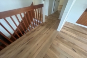 Sanding Oak flooring.