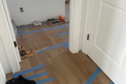 Installing French Oak flooring.