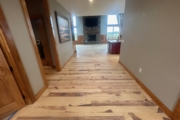 Sanding Heart Pine floors.