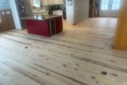 Sanding Heart Pine floors.