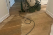 Sanding Oak floors.