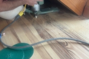 Sanding Heart Pine floors.