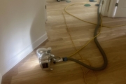 Sanding Oak floors.