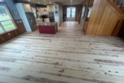 Sanding Heart Pine floors.