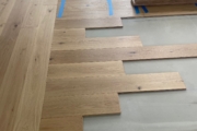 Installing European Oak hardwood flooring.