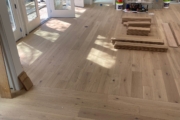 Installing European Oak hardwood flooring.