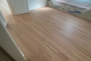 Finished engineered Red Oak flooring.