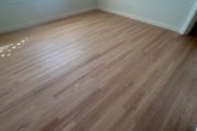 Finished engineered Red Oak flooring.