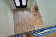 Sanding stairs.