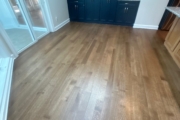 Refinished Red Oak flooring.