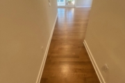 Refinished Red Oak flooring.