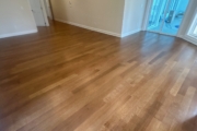 Refinished Red Oak flooring.