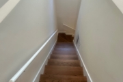 Refinished Red Oak flooring.