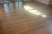 Refinished Red Oak flooring.