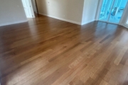 Refinished Red Oak flooring.