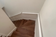 Refinished Red Oak flooring.