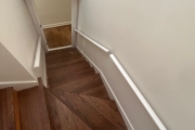 Refinished Red Oak flooring.