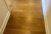 Refinished Red Oak flooring.