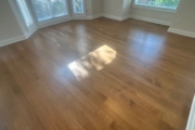 Refinished Red Oak flooring.