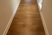 Refinished Red Oak flooring.