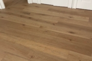 Installed French Oak hardwood flooring.