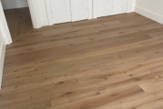 Installed French Oak hardwood flooring.