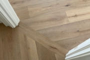 Installed French Oak hardwood flooring.