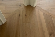 Installed French Oak hardwood flooring.