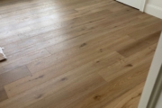 Installed French Oak hardwood flooring.