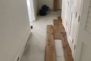 Installing 8" wide French Oak hardwood flooring.