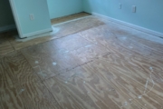 Leveled plywood subfloor.