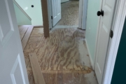 Leveled plywood subfloor.