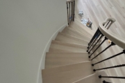 Match stained staircase and LPV floor.