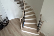 Match stained staircase and LPV floor.